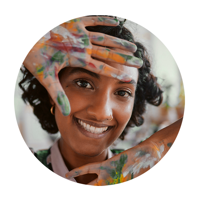 "Save the date" sign displayed prominently on a vibrant orange brick wall, creating a striking visual announcement.