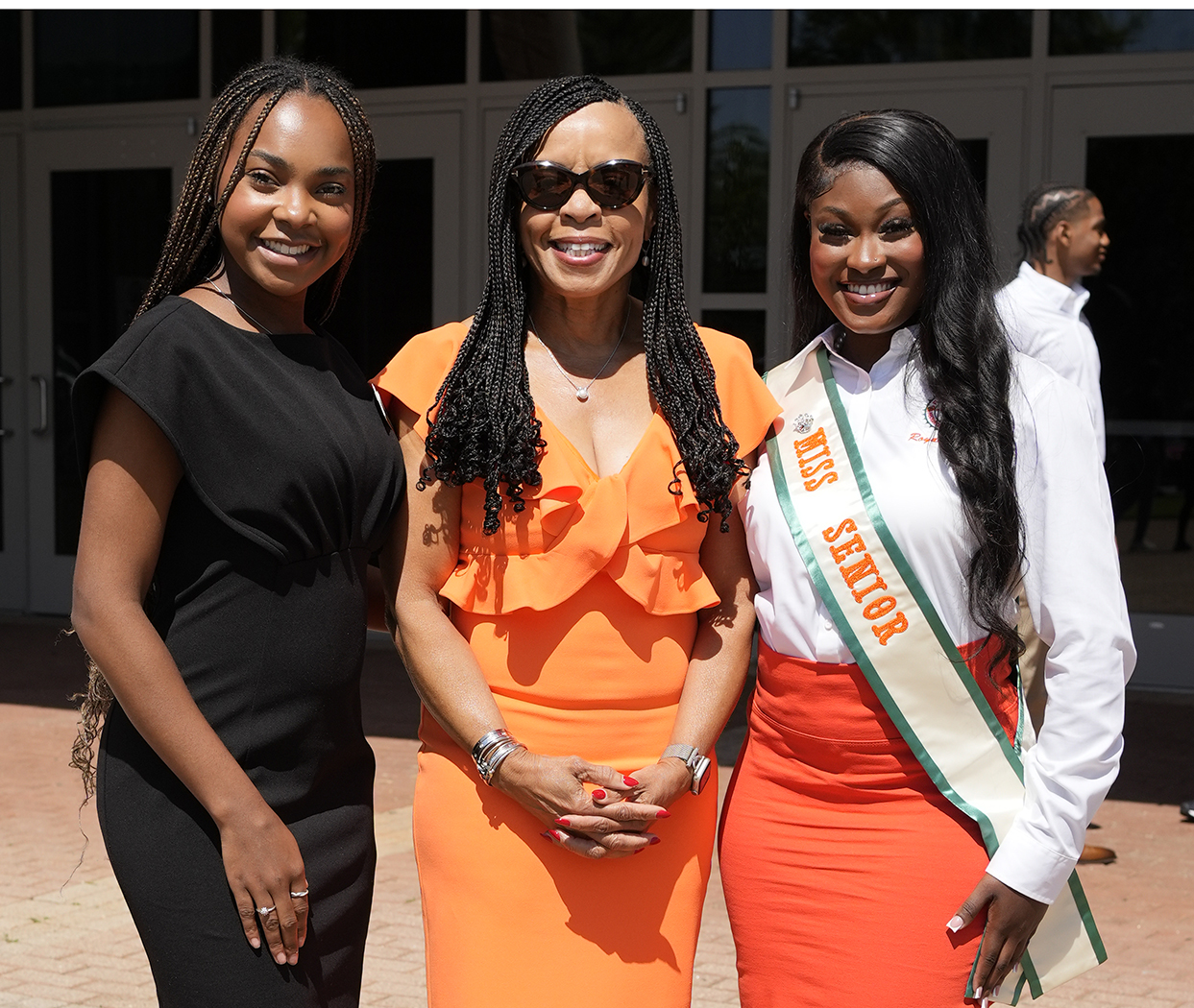 (From left) SGA President Loryn May, Alumna Kim Godwin Manning and Miss Senior Attendant Reanna Desameau.