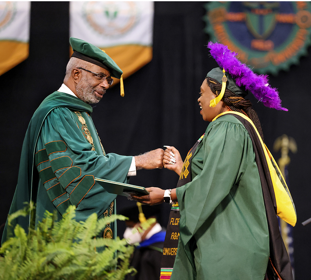 Robinson greeting grads