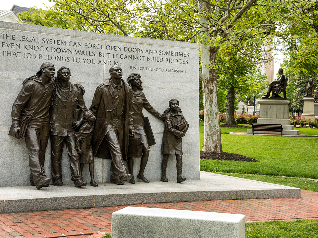 Historic Capitol Square Richmond Virginia Civil Rights Monument with quote from Thurgood Marshall (first African American U.S. Supreme Court justice). It reads: "The legal system can force open doors, and sometimes-even knock down walls, but it cannot build bridges. That job belongs to you and me."