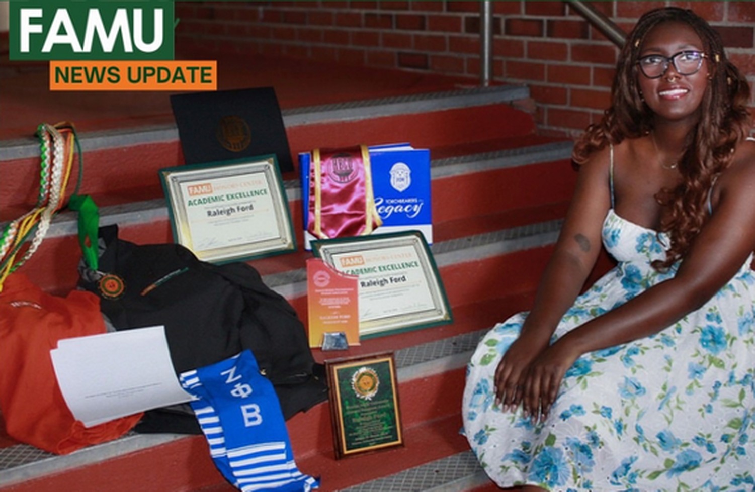FAMU Honors student seated beside academic awards, certificates, and graduation regalia