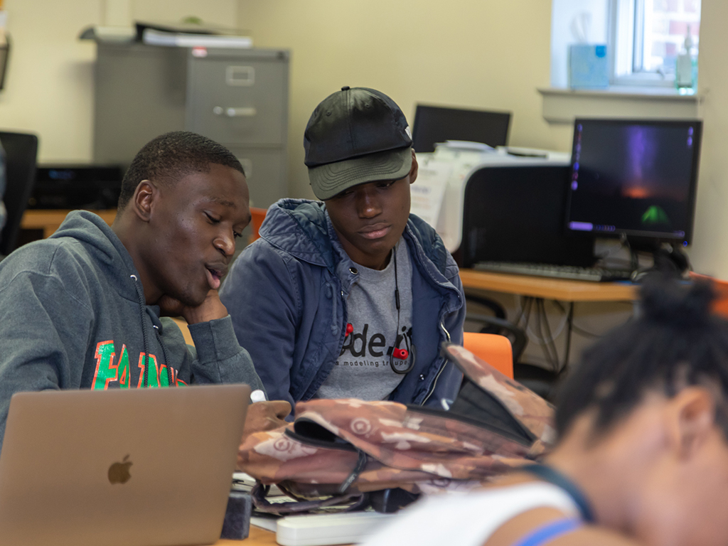 two male students in study lounge