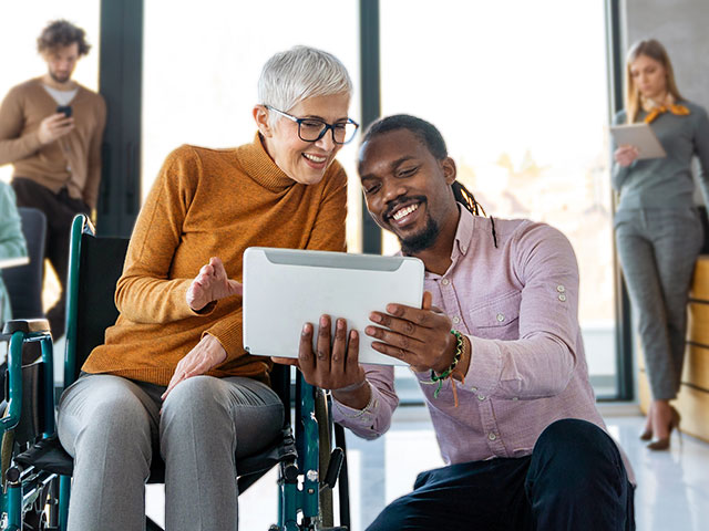 Human resources representative assisting employee with retirement selections