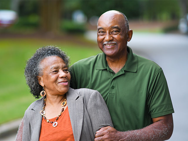 Elderly couple smiling