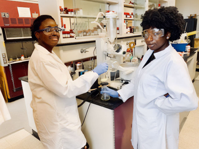 Two students in lab