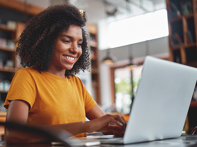 young woman using a laptop